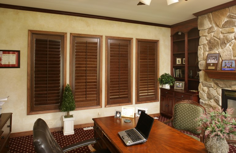 Hardwood plantation shutters in a Austin home office
